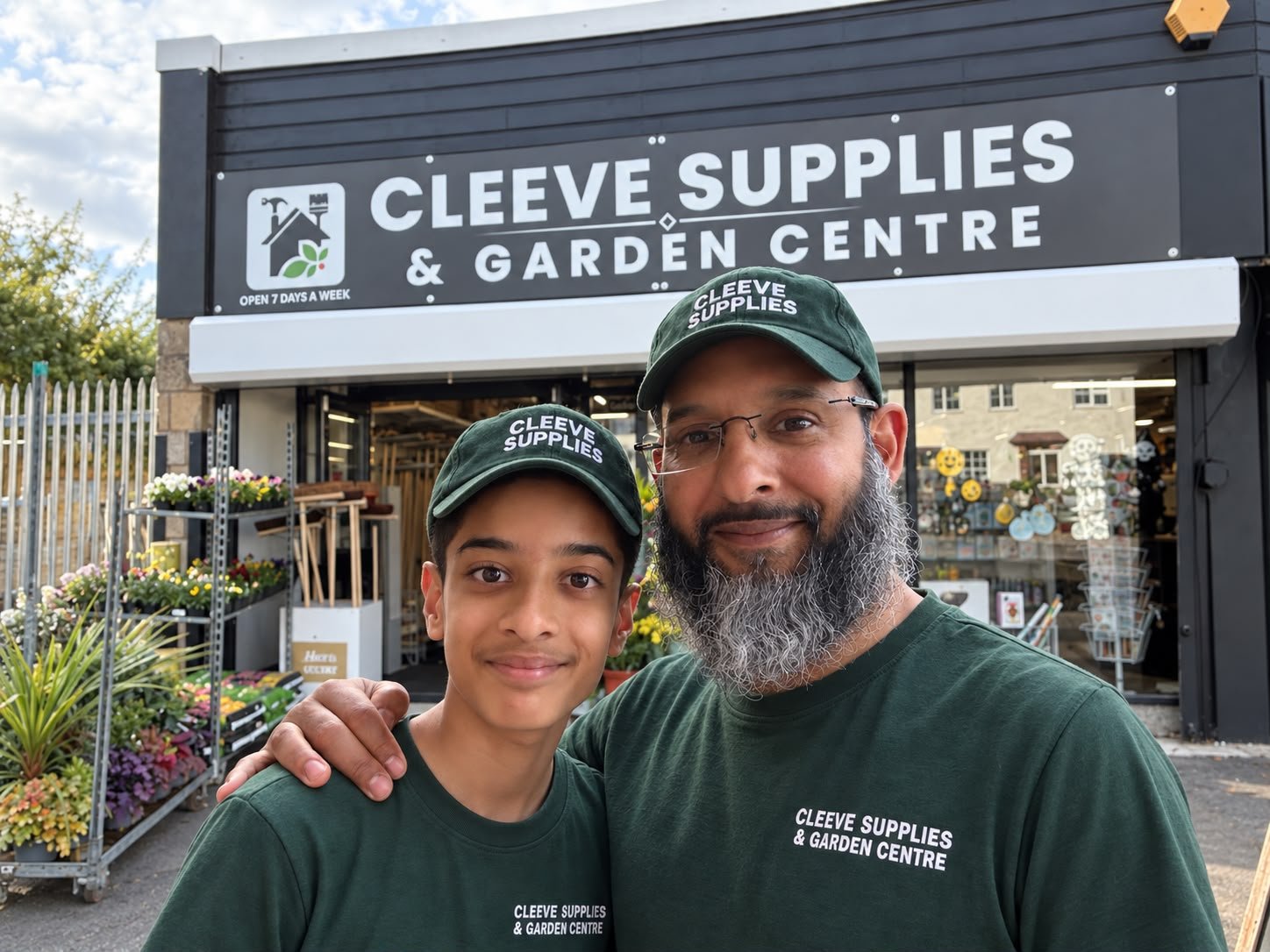 Adnan and the Cleeve Supplies team outside the shop