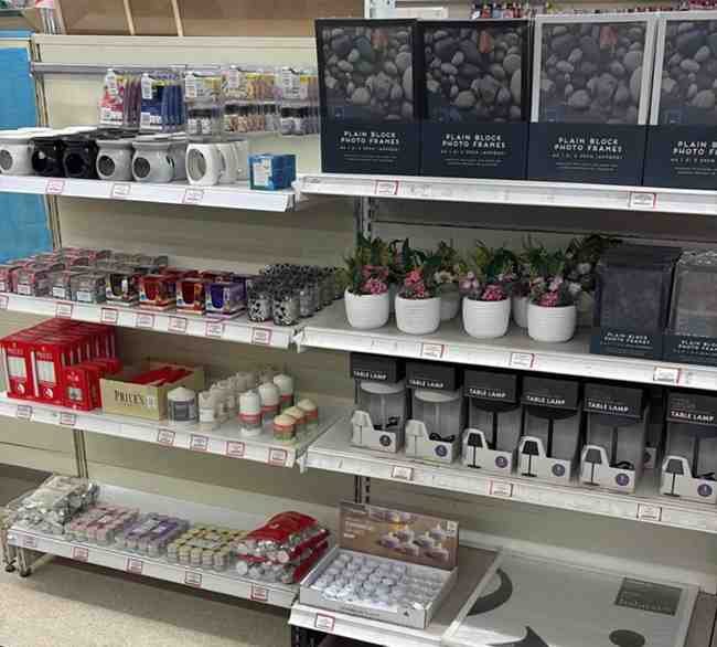 Shelves of home essentials at Cleeve Supplies